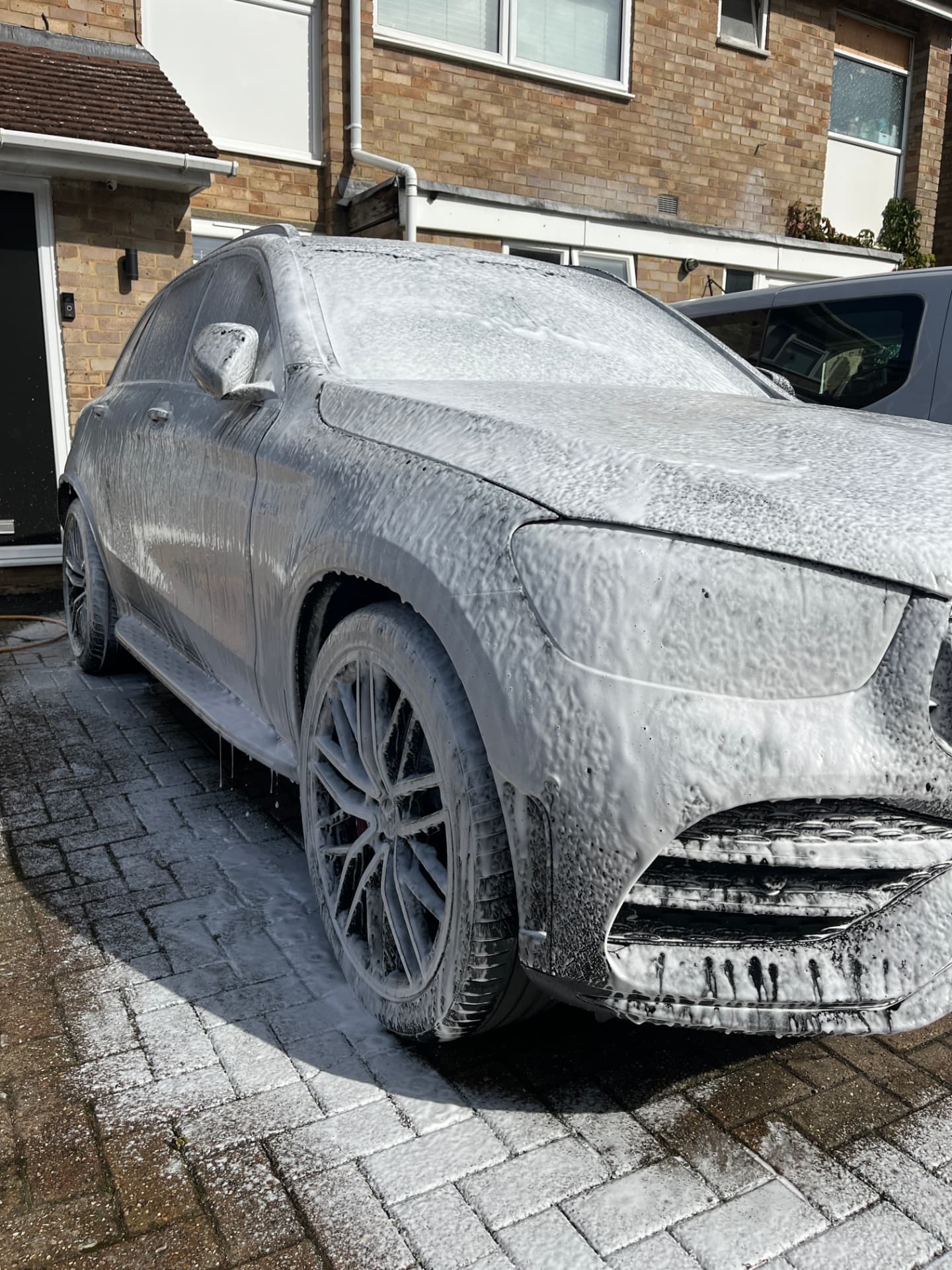 Mercedes SUV covered in snow foam