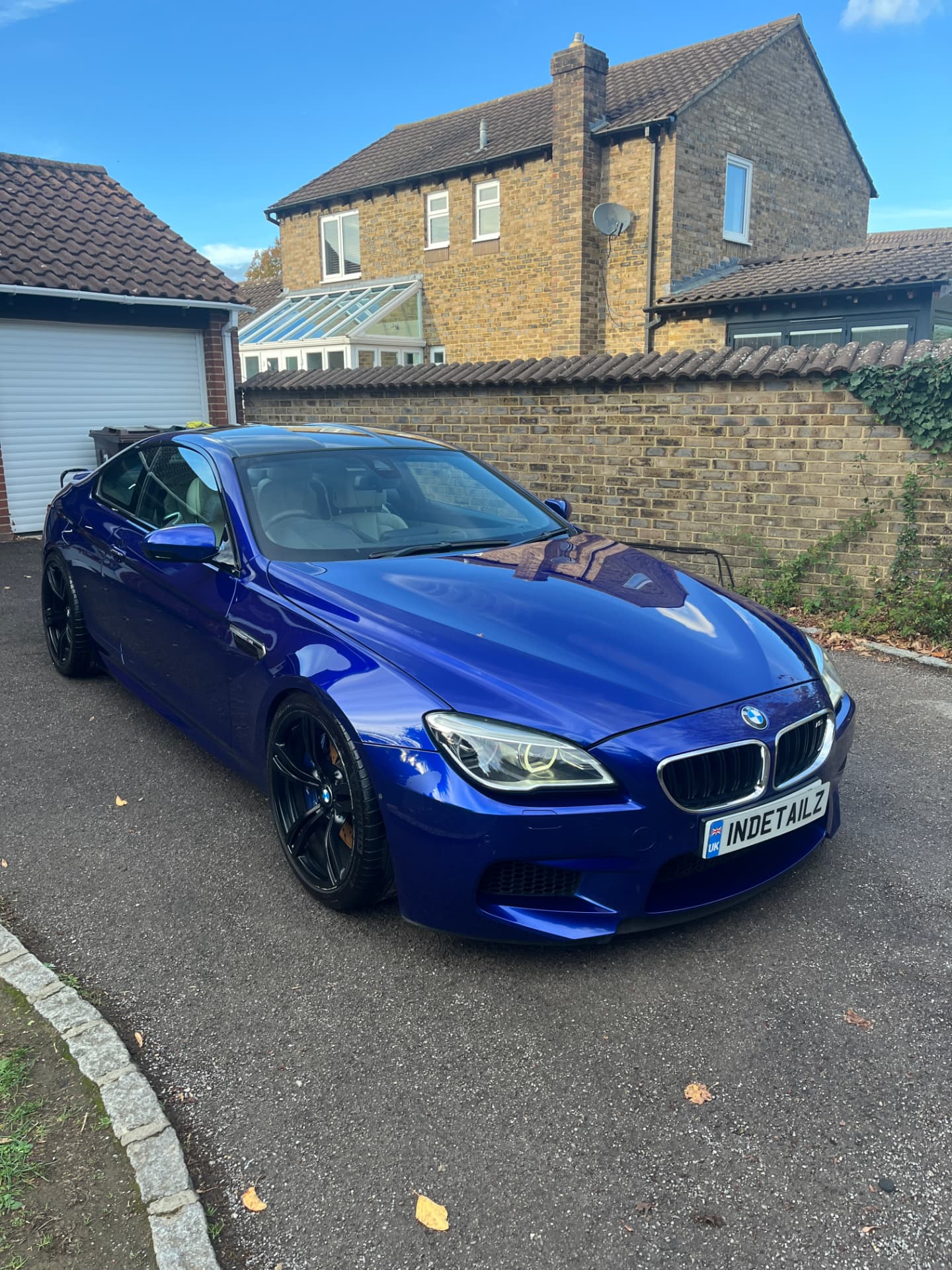 Blue BMW M6 front after a detail